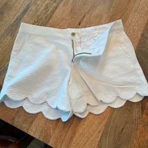 White Lilly Pulitzer size four shorts. Scalloped edges!